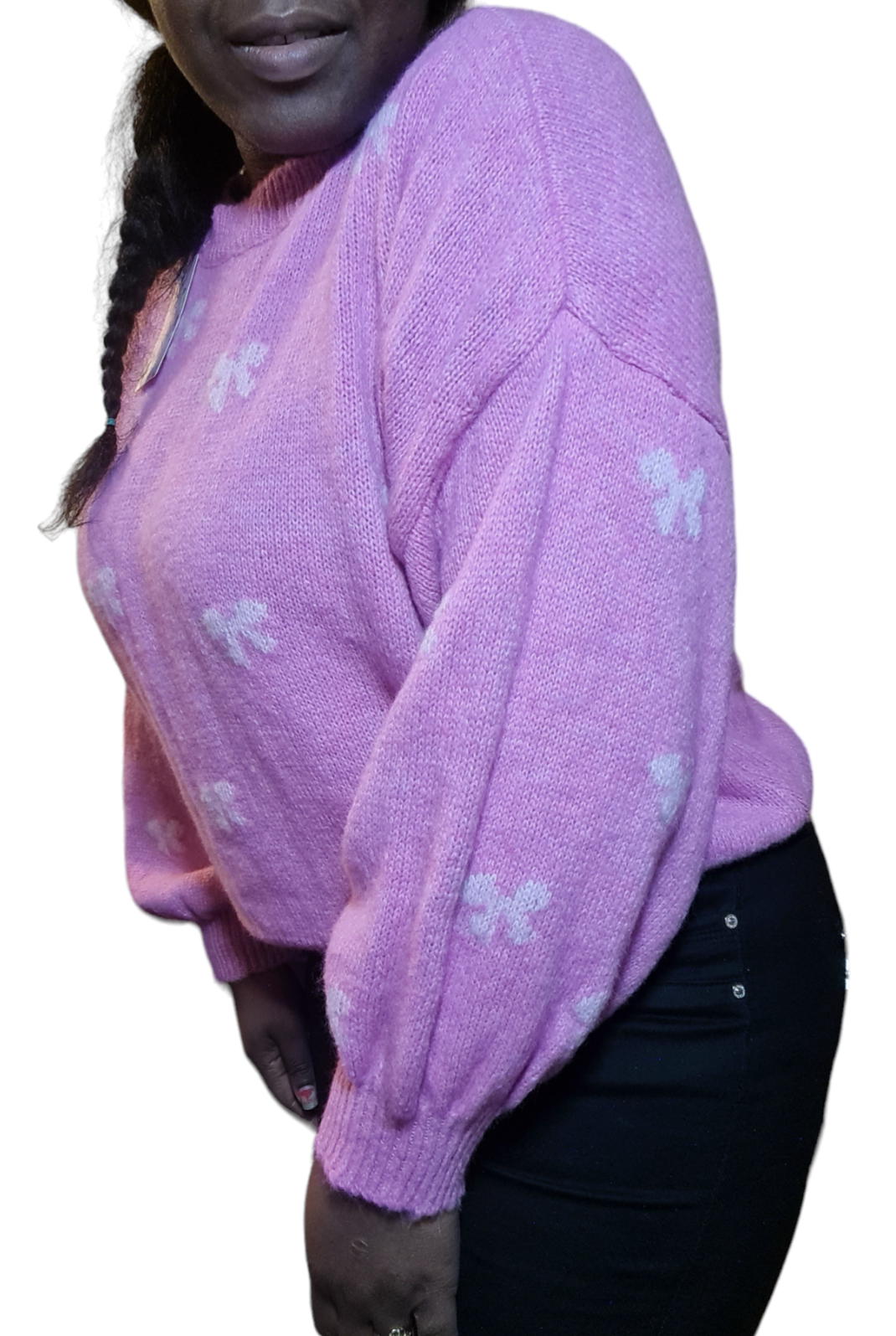 Roze trui met lichtroze strikjes