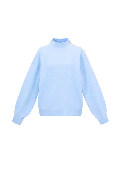 Sweater with buttons on the shoulder
