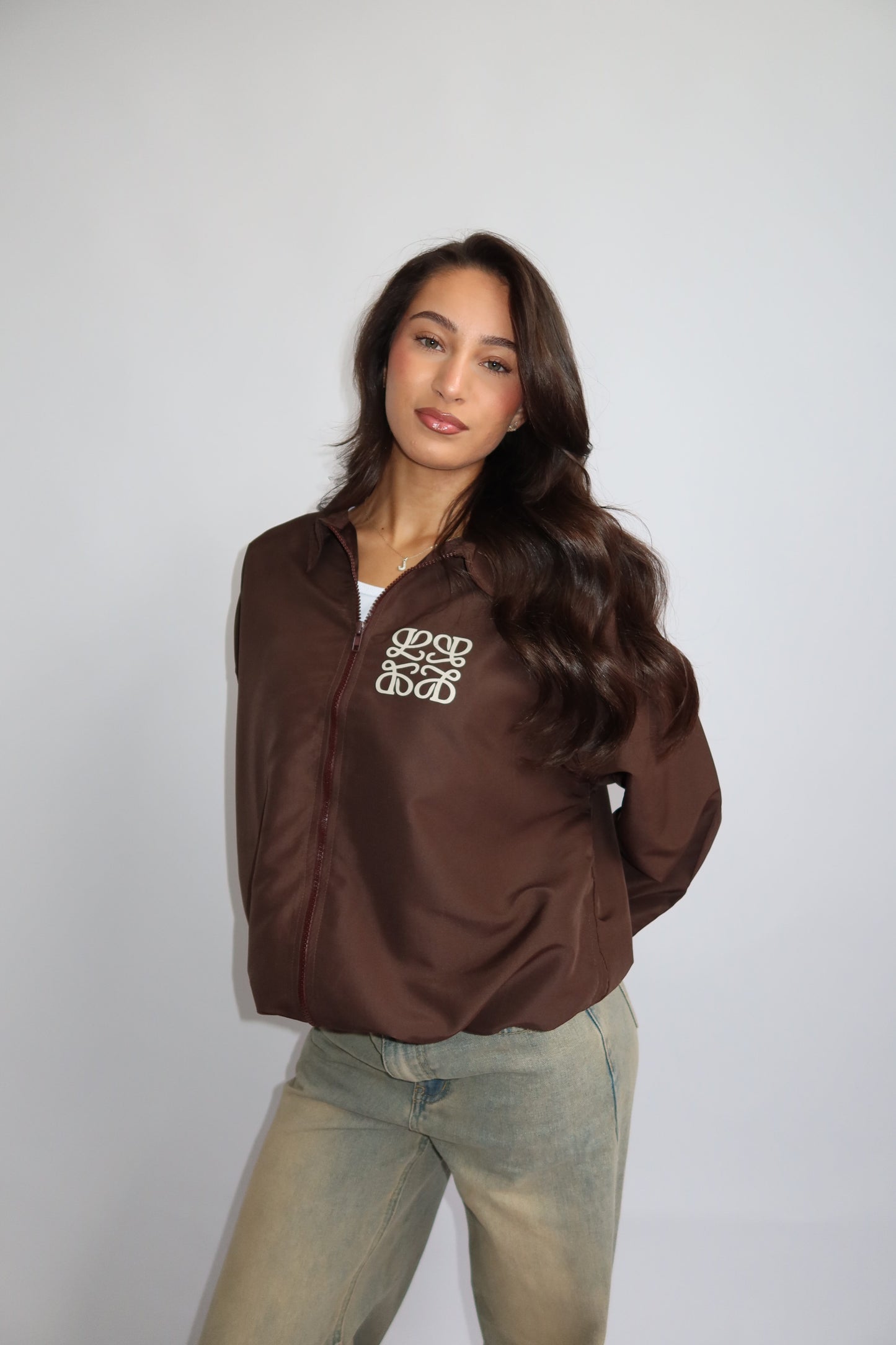 Priority jack; Priority monogram wind jacket - Bruin