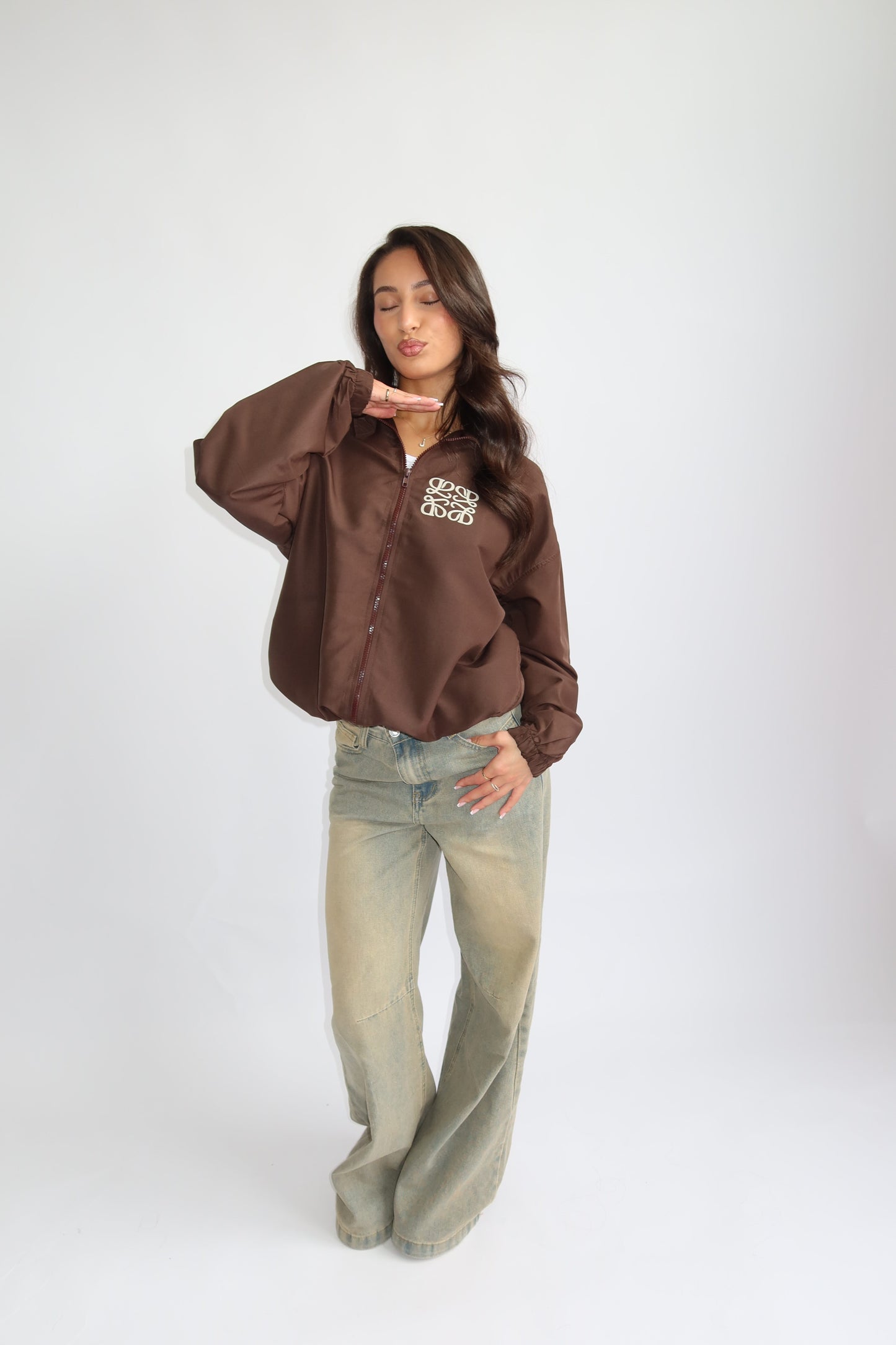 Priority jack; Priority monogram wind jacket - Bruin