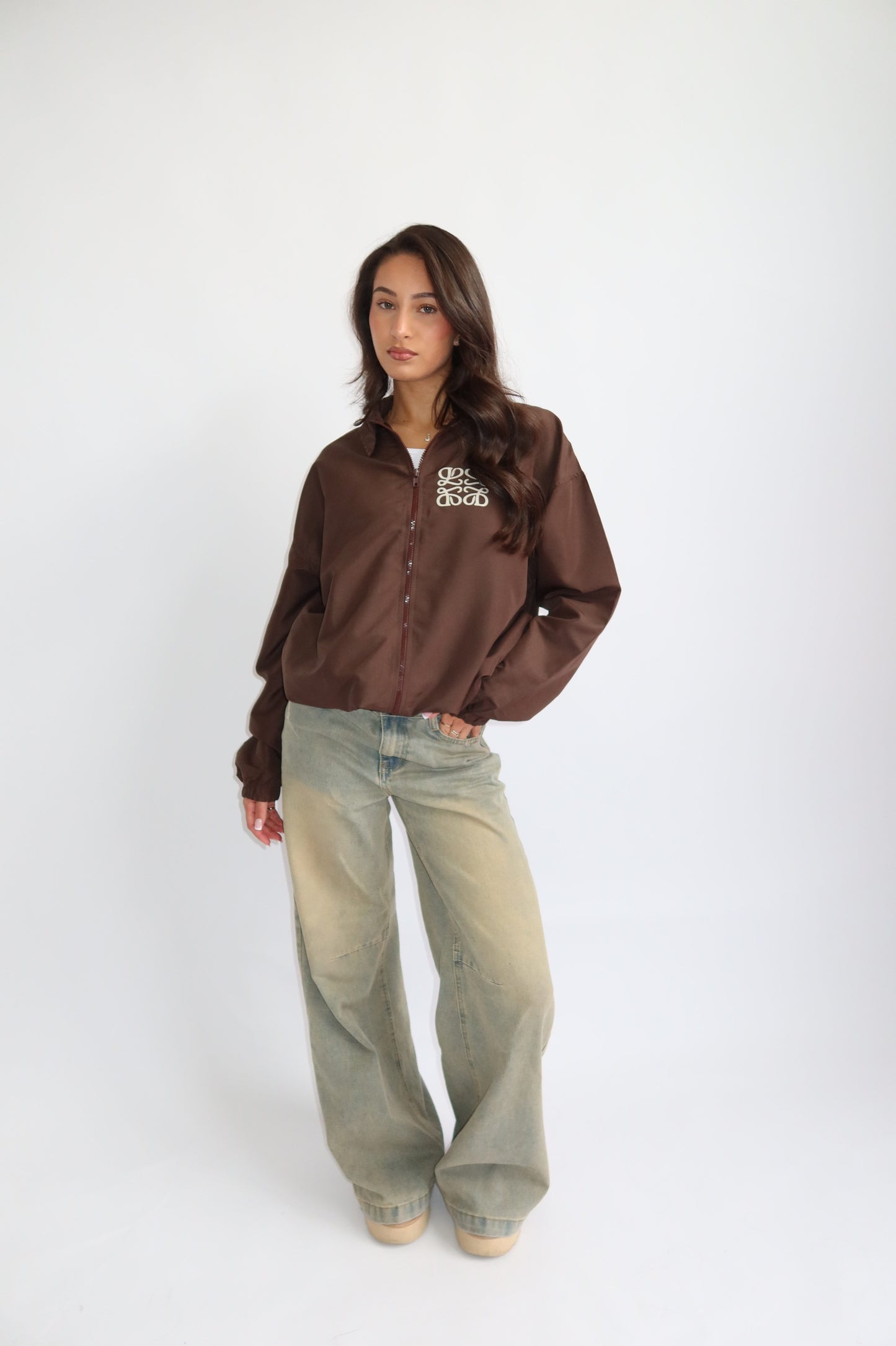 Priority jack; Priority monogram wind jacket - Bruin