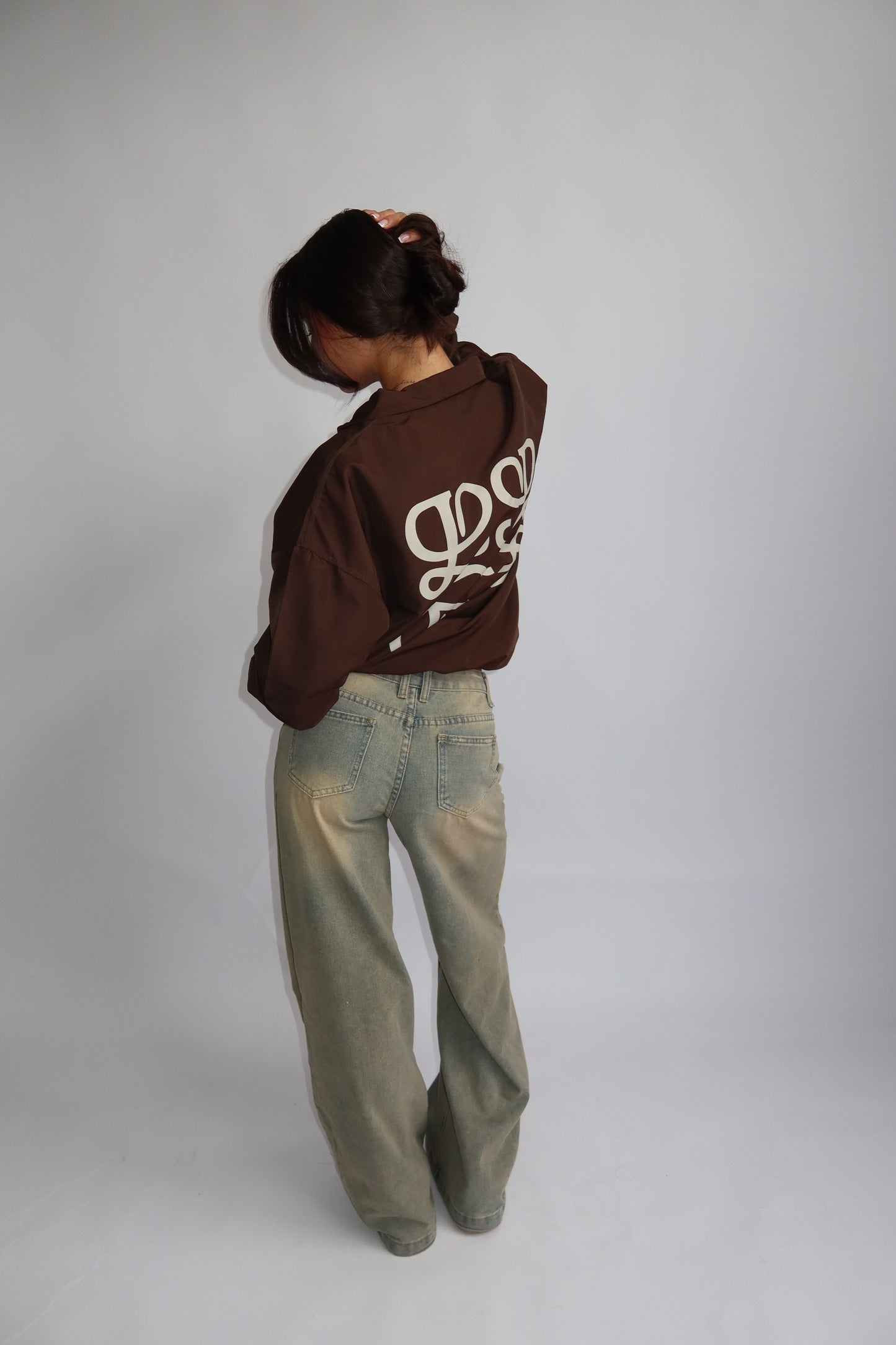 Priority jack; Priority monogram wind jacket - Bruin