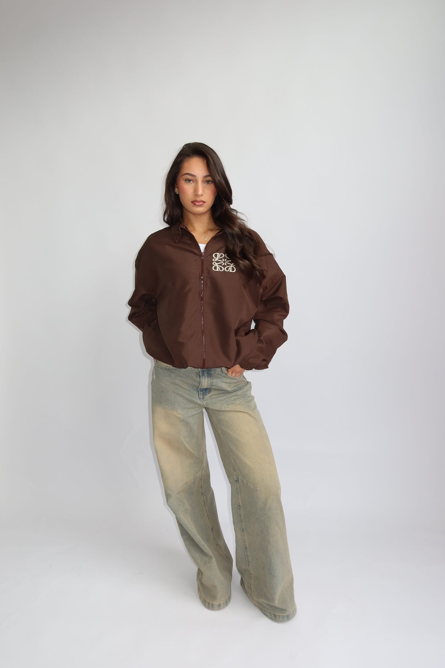 Priority jack; Priority monogram wind jacket - Bruin
