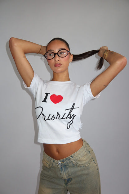 Priority t-shirt dames; I Love Priority Top - White/ Wit | Tee Time collectie