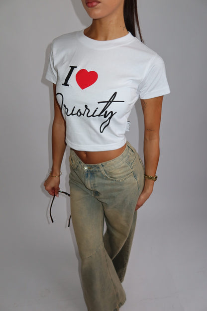 Priority t-shirt dames; I Love Priority Top - White/ Wit | Tee Time collectie
