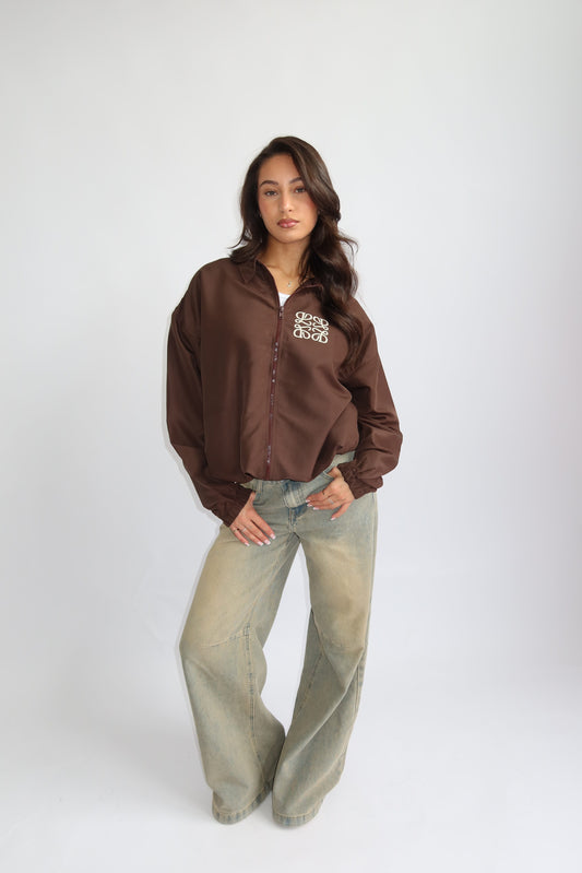 Priority jack; Priority monogram wind jacket - Bruin