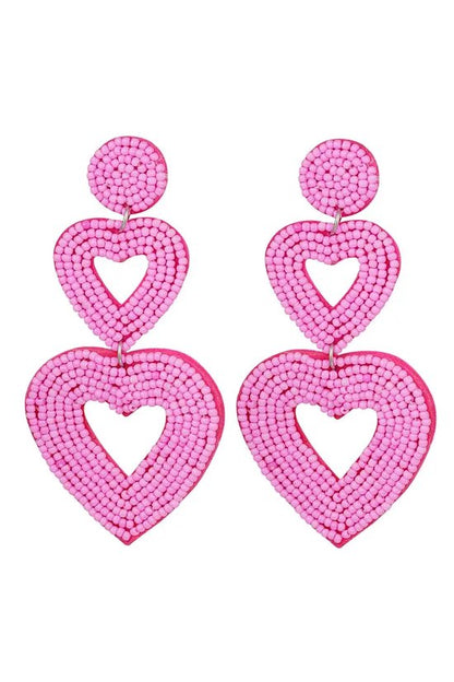 Grote donker roze statement oorbellen 3 hartjes/ hart groot