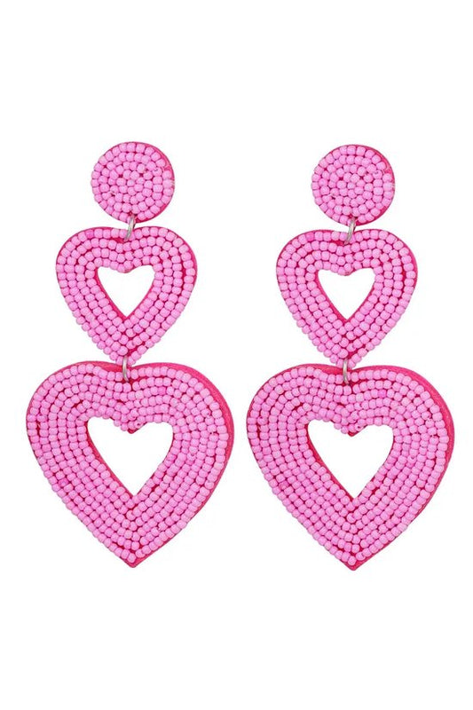 Grote donker roze statement oorbellen 3 hartjes/ hart groot