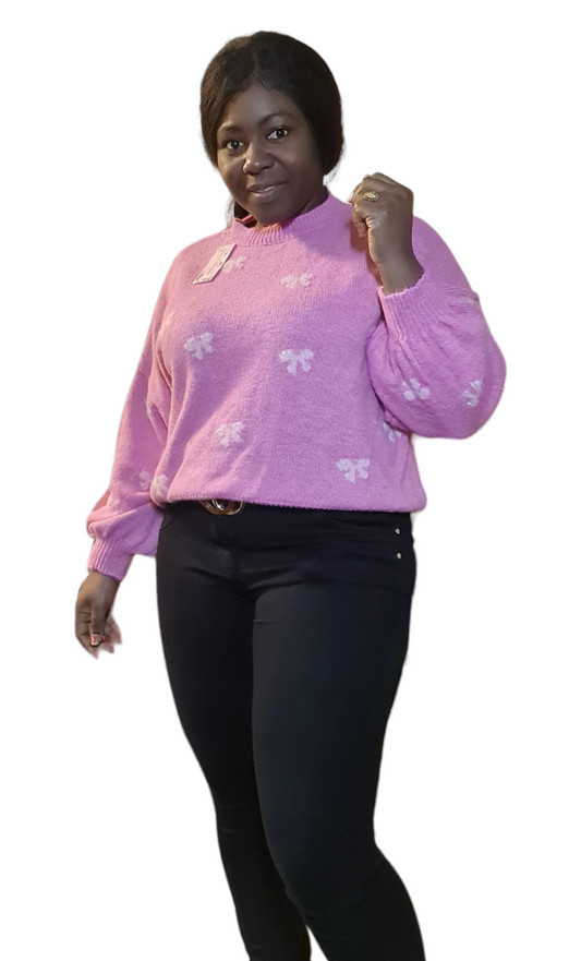 Roze trui met lichtroze strikjes