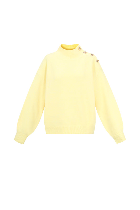 Sweater with buttons on the shoulder